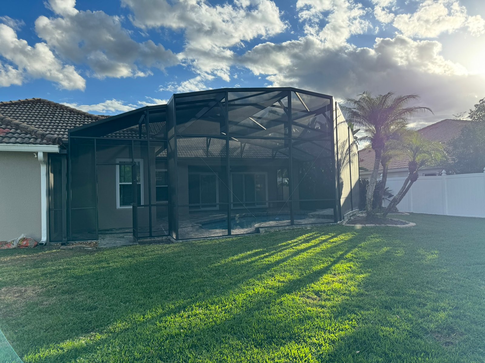 Lanai retrofit with hurricane mesh in Port St. Lucie