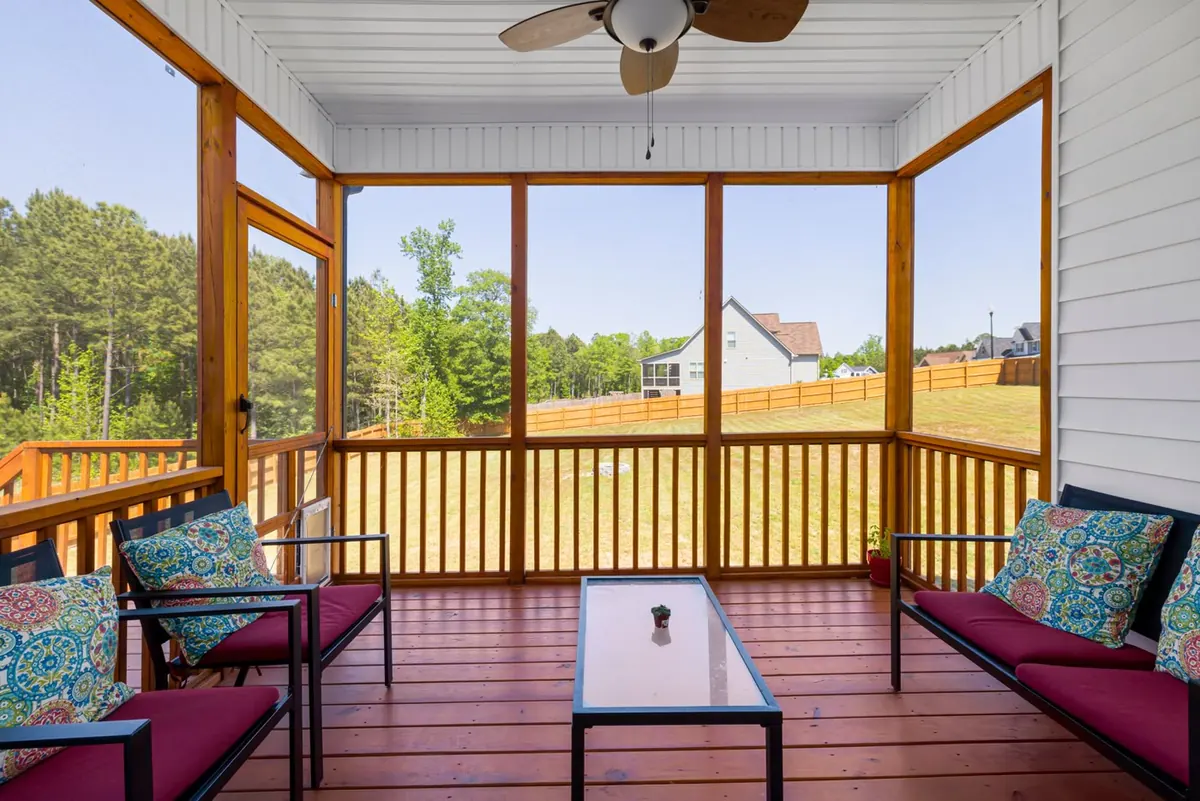 Screened lanai porch with tight insect mesh panels and a screen door